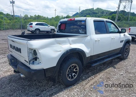 2015 Ram 1500 Rebel from USA, damaged, VIN 1C6RR7YT0FS751169